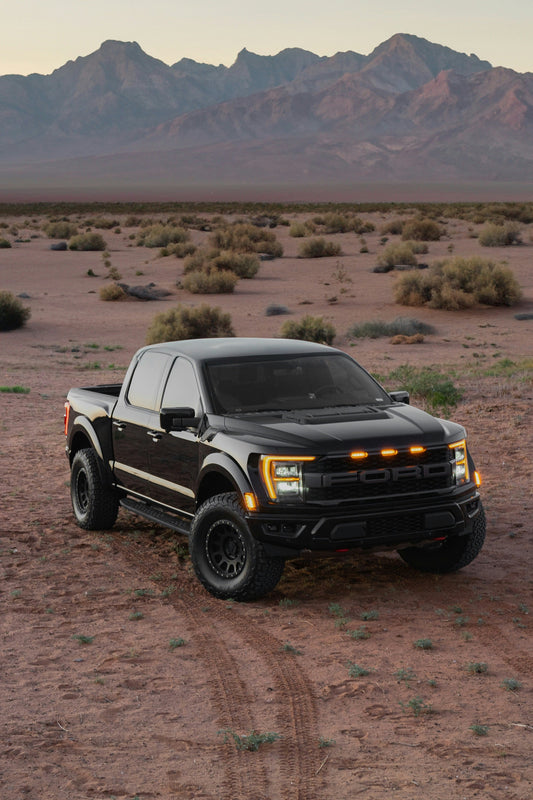 Hard folding tonneau cover on black pickup truck
